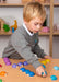 Boy playing with wooden Sorting Lady birds