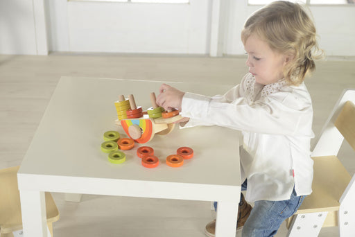 Child playing with Wooden Balancing Rainbow Toy