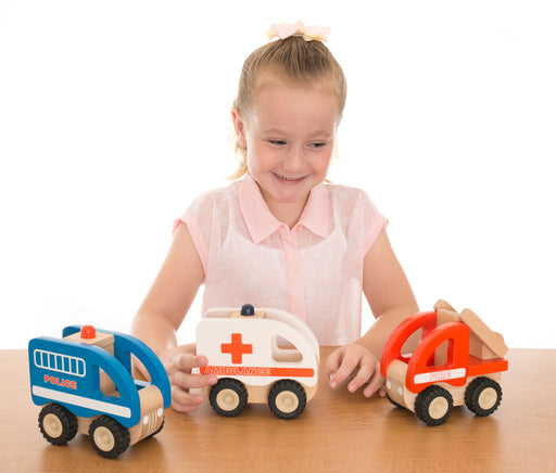 Child playing with Wooden police car