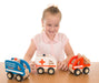 Child playing with Wooden police car